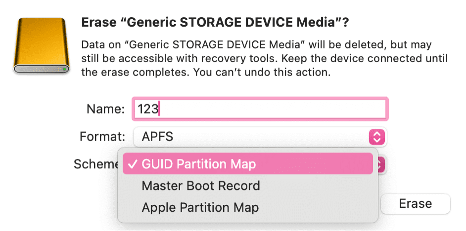 Settings screen for erasing a USB flash drive using Disk Utility with the Scheme dropdown menu open and the GUID Partition Map option highlighted.