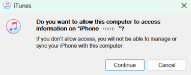 iTunes prompt requesting access to an iPhone.