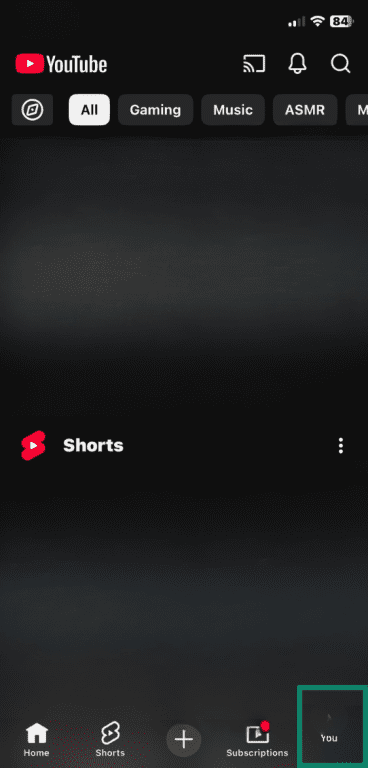 YouTube app open with profile picture icon highlighted